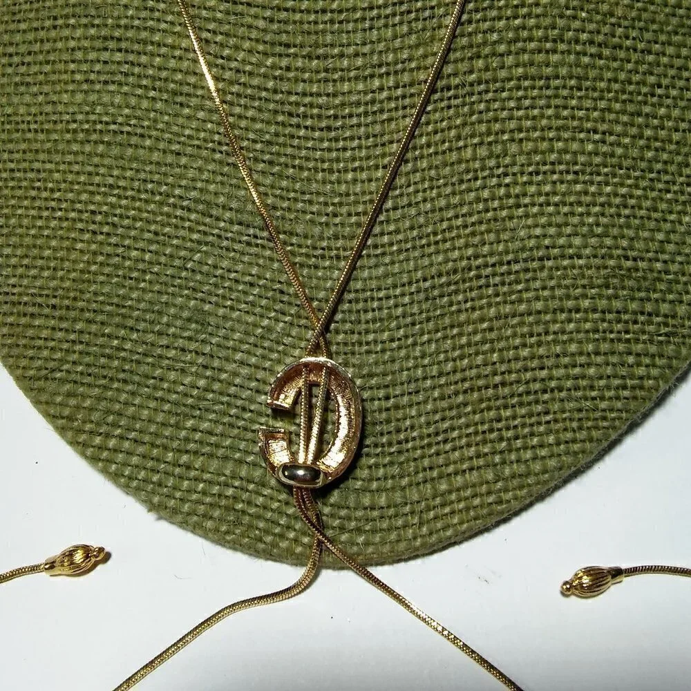 Women`s gold tone initial C lariat crystal neckl.